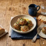 lamb meatballs from the air fryer on a rustic wooden table
