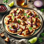 Barbecued chicken tortilla pizzas on a rustic wooden table