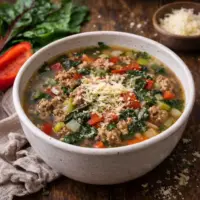 bell swiss chicken soup on a rustic wooden table