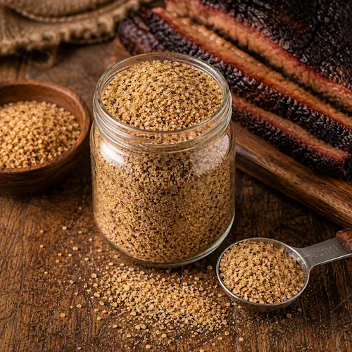 brisket finishing shake served on a rustic wooden table with smoky barbecue seasoning blend