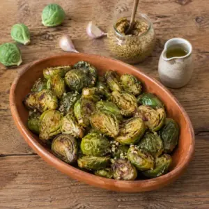 Garlic mustard Brussels sprouts roasted until golden and caramelized