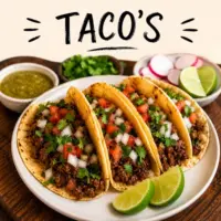 Taco recipes with beef chicken shrimp and fresh toppings served on a rustic wooden table