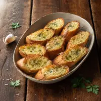 Golden garlic bread with parsley butter and melted Parmesan.